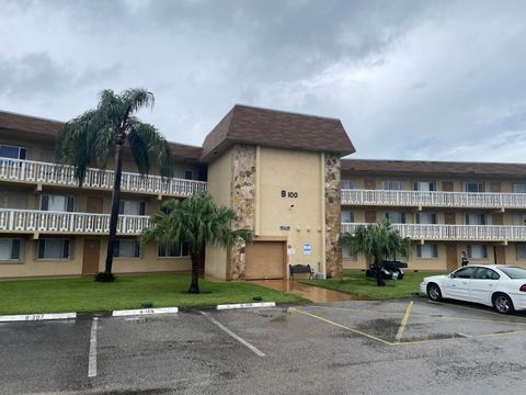 Photo of 100 Village Green Circle E #103, Palm Springs, FL 33461 (MLS # RX-11129471)