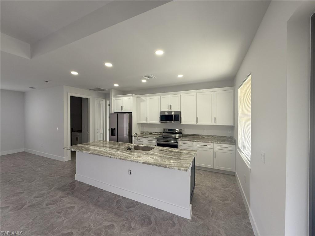 5312 3rd ST W
