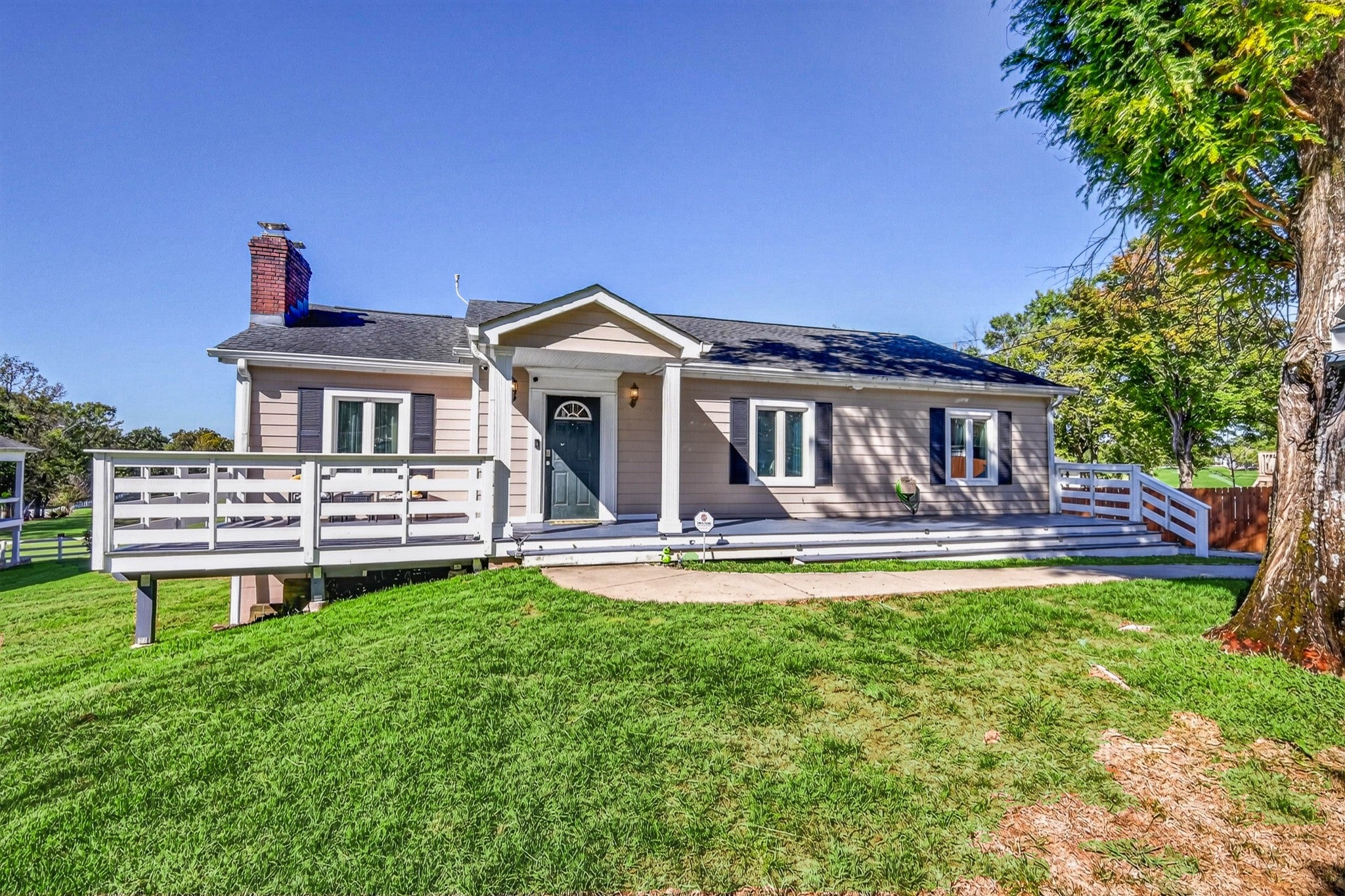 6-bed home for sale in Old Hickory, TN 37138, 130 Park Cir Single-story home with tan siding, a covered front porch with white columns and a deck along the front