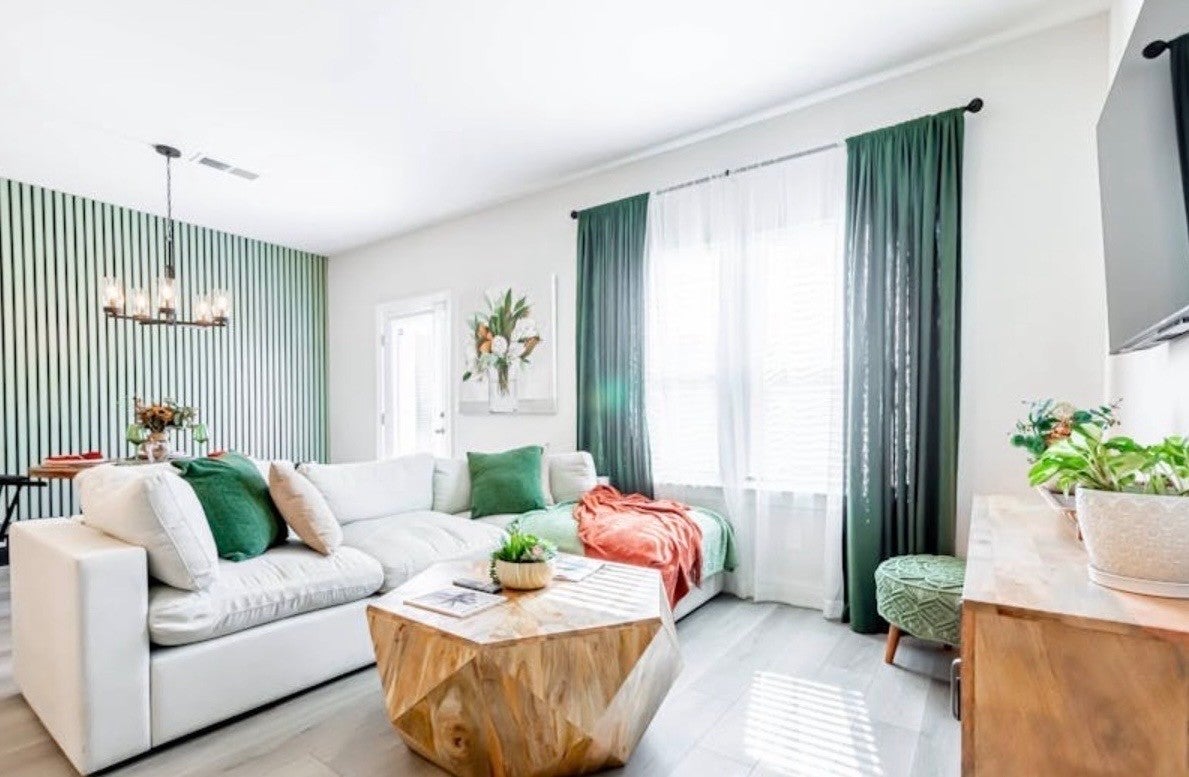 3-bed condo for sale in Nashville, TN 37207, 4616 Ridge Bend Dr Kitchen with white cabinets, stone countertops, a stainless steel range and a dishwasher beside the sink