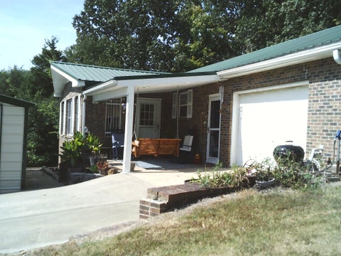 Photo of 104 Tobaccoport Dock Rd, Bumpus Mills, TN 37028 (MLS # 3610142)