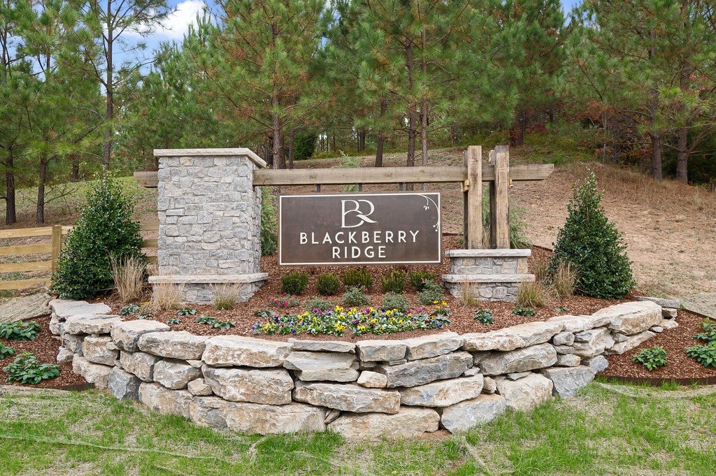 5-bed home sold in Franklin, TN 37064, 5105 Cobbler Ridge Ct Single family home at 5105 Cobbler Ridge Ct, Franklin, TN 37064, shown by a stone entrance sign for the Blackberry Ridge subdivision