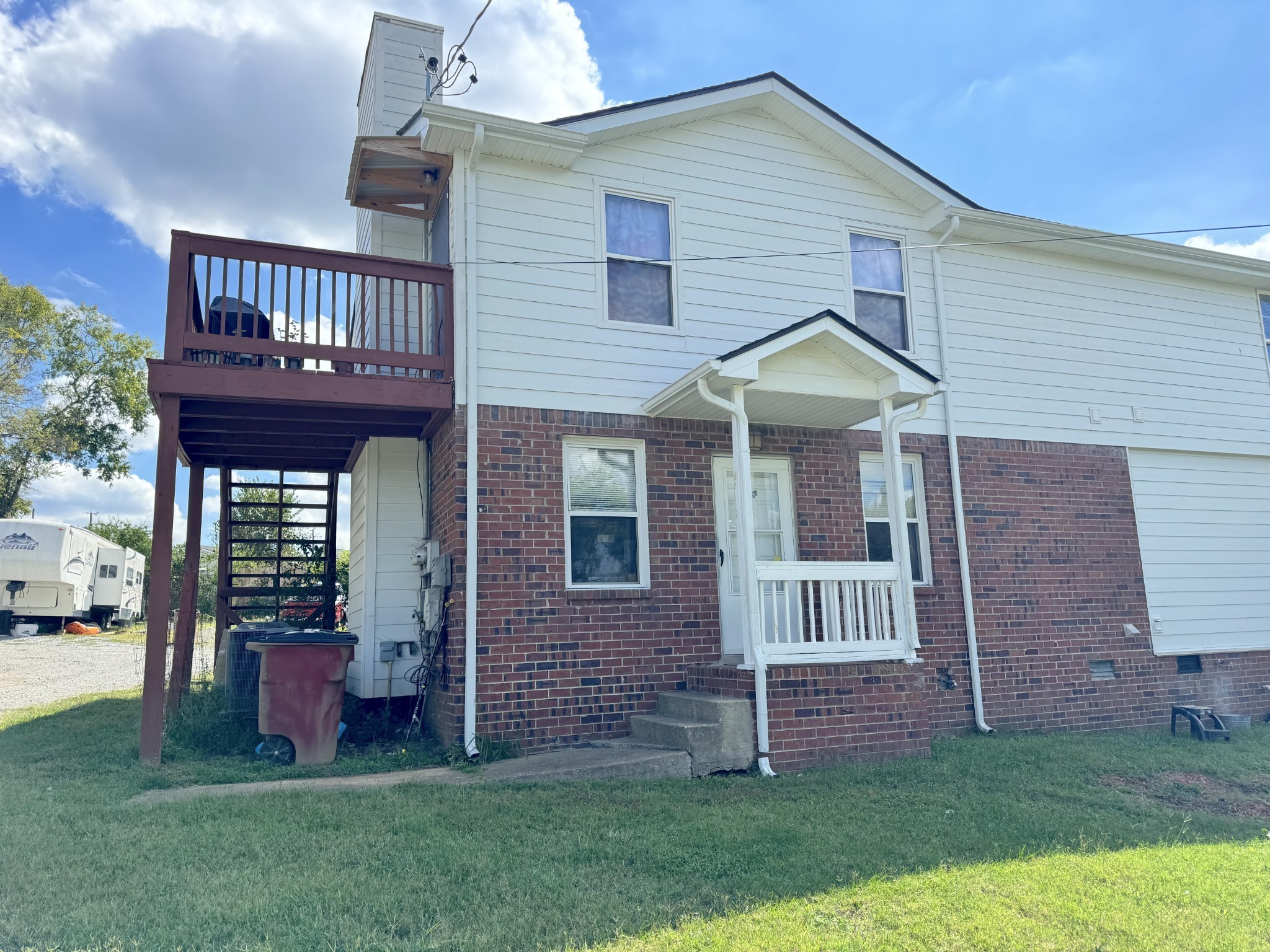 Front of Duplex. The units are on the left to and bottom.