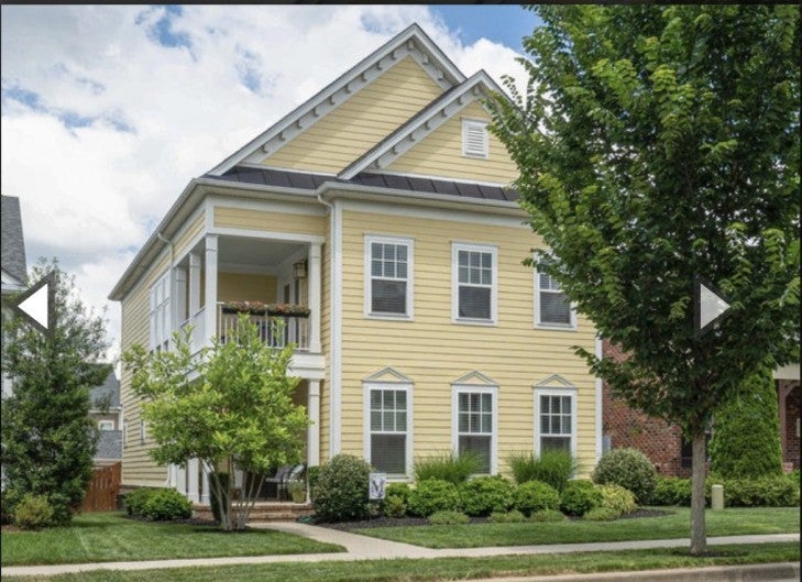 3-bed home for sale in Franklin, TN 37064, 507 Cobert Ln Two-story single family home at 507 Cobert Ln, Franklin, TN 37064, with yellow lap siding, white trim and a second-floor balcony