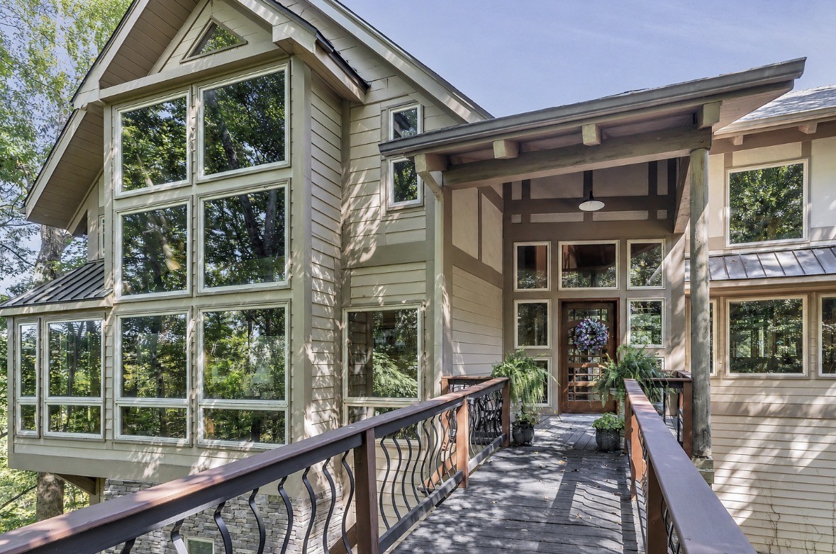 Chalet warmth meets Frank Lloyd Wright elegance in a beautiful woodland setting.