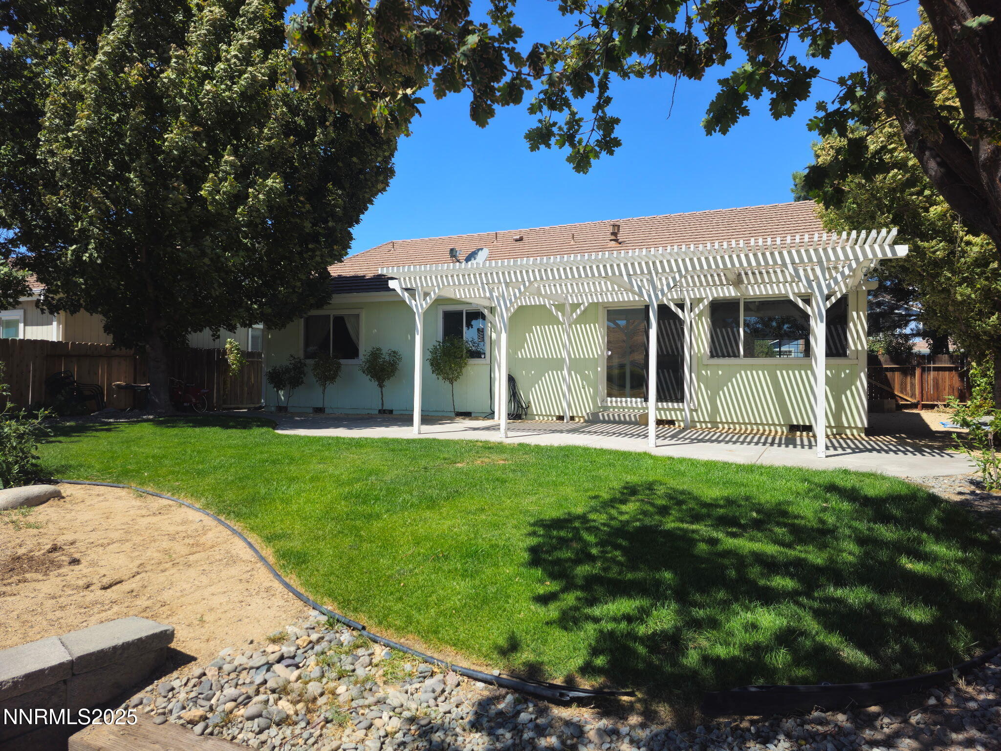 Backyard looking at house