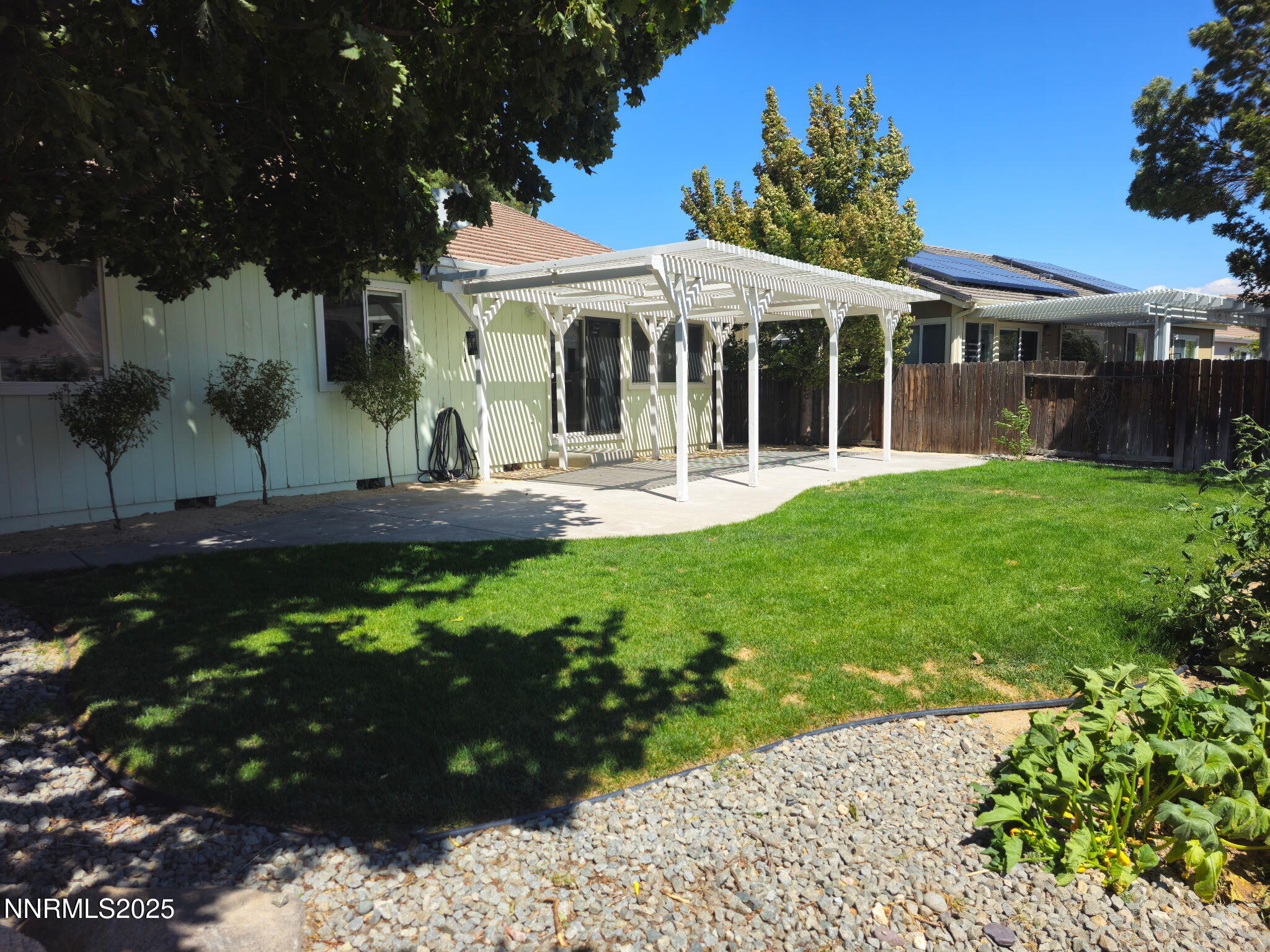Backyard looking at house