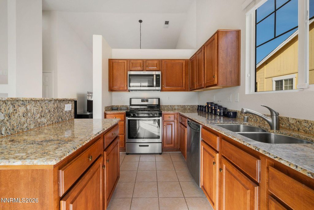 Photo of 8936 Finnsech Drive, Reno, NV 89506 (MLS # 260000423)