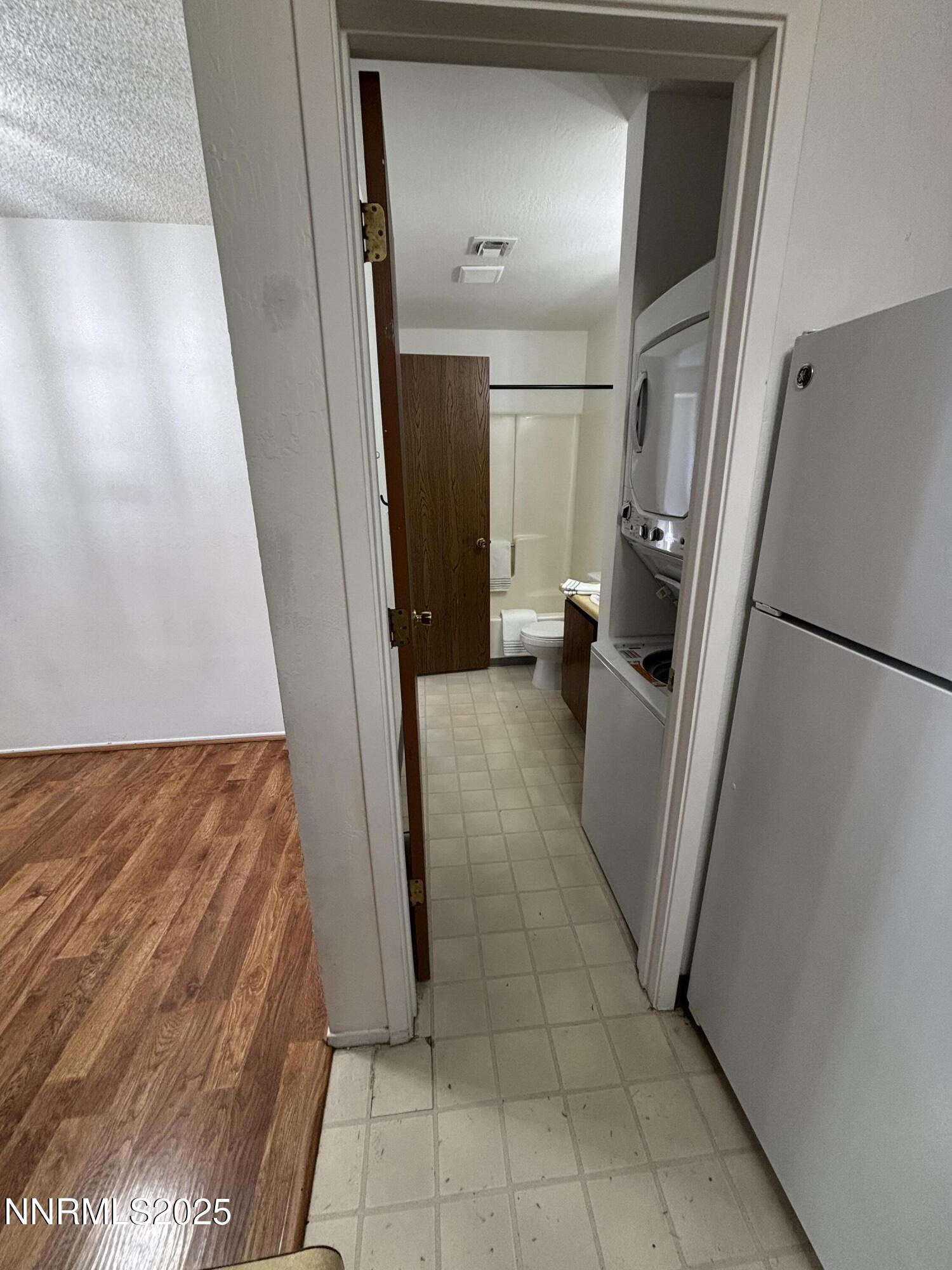 Laundry area in bathroom off kitchen