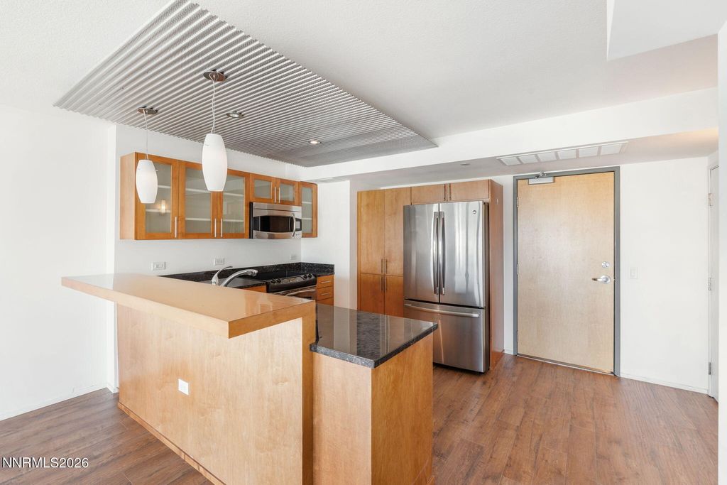 Photo of 255 N Sierra Street #UNIT 1012, Reno, NV 89501 (MLS # 250057645)