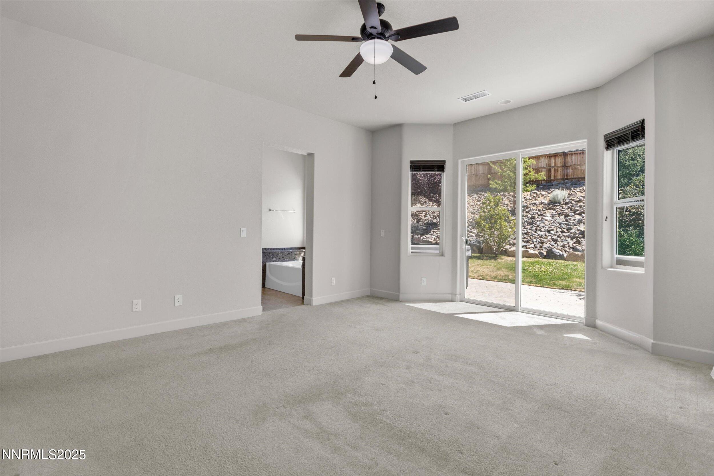 Primary Bedroom into Bathroom