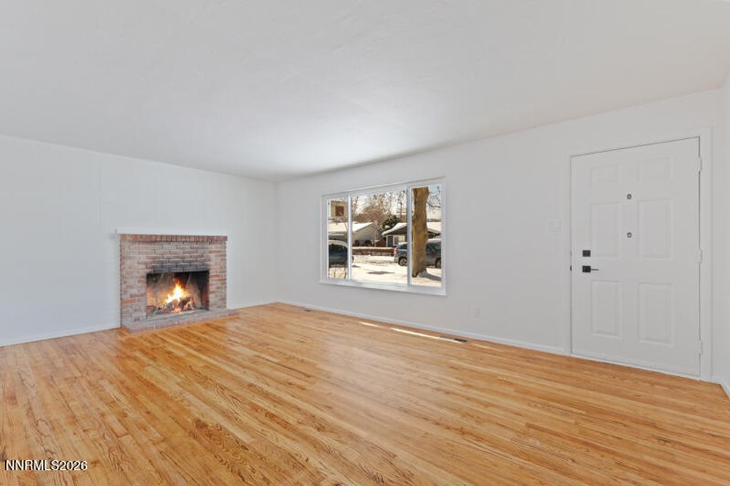 Photo of 810 Lahontan Way, Reno, NV 89509 (MLS # 260001974)