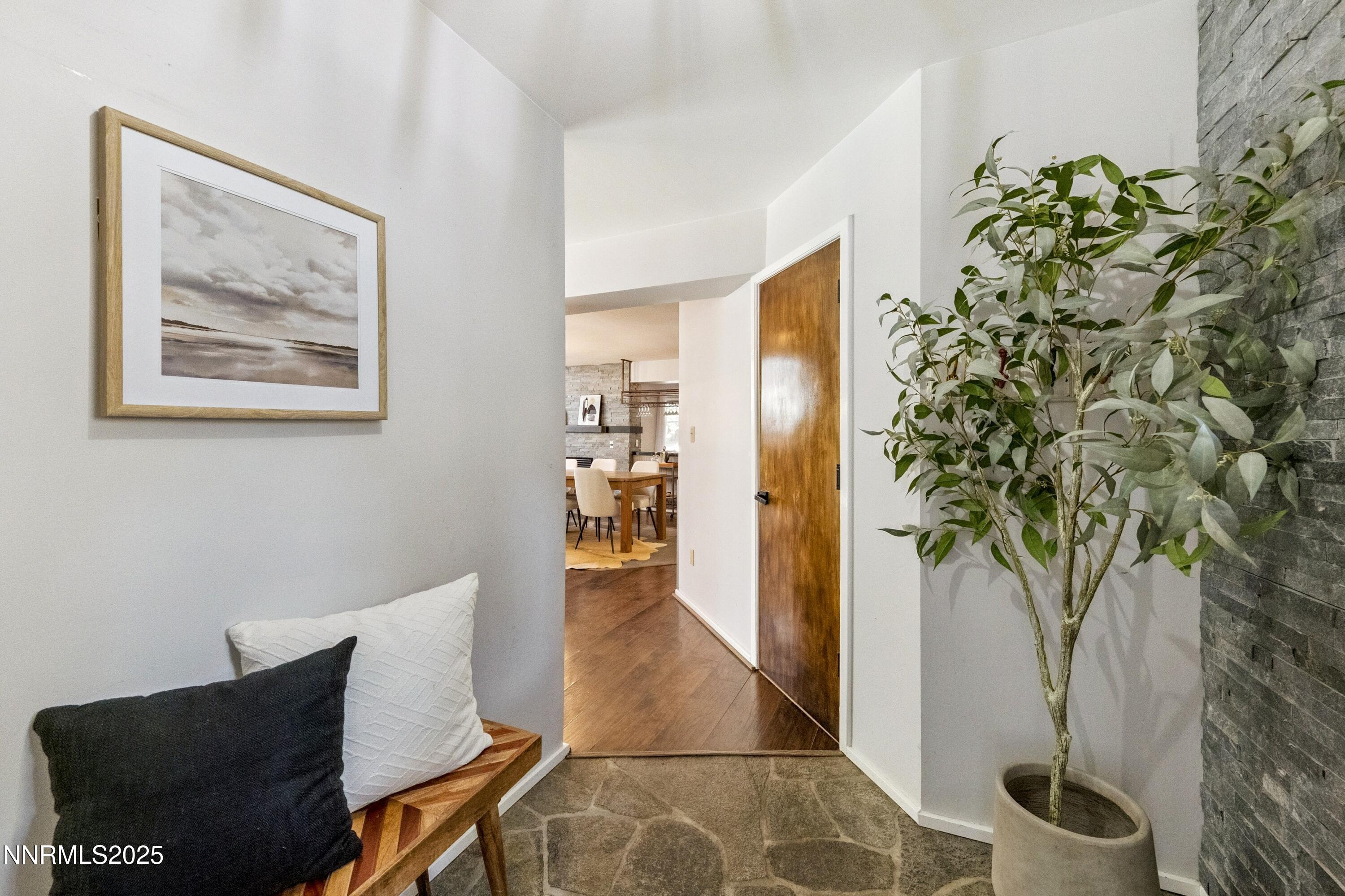 Foyer, hallway and 1/2 bath door