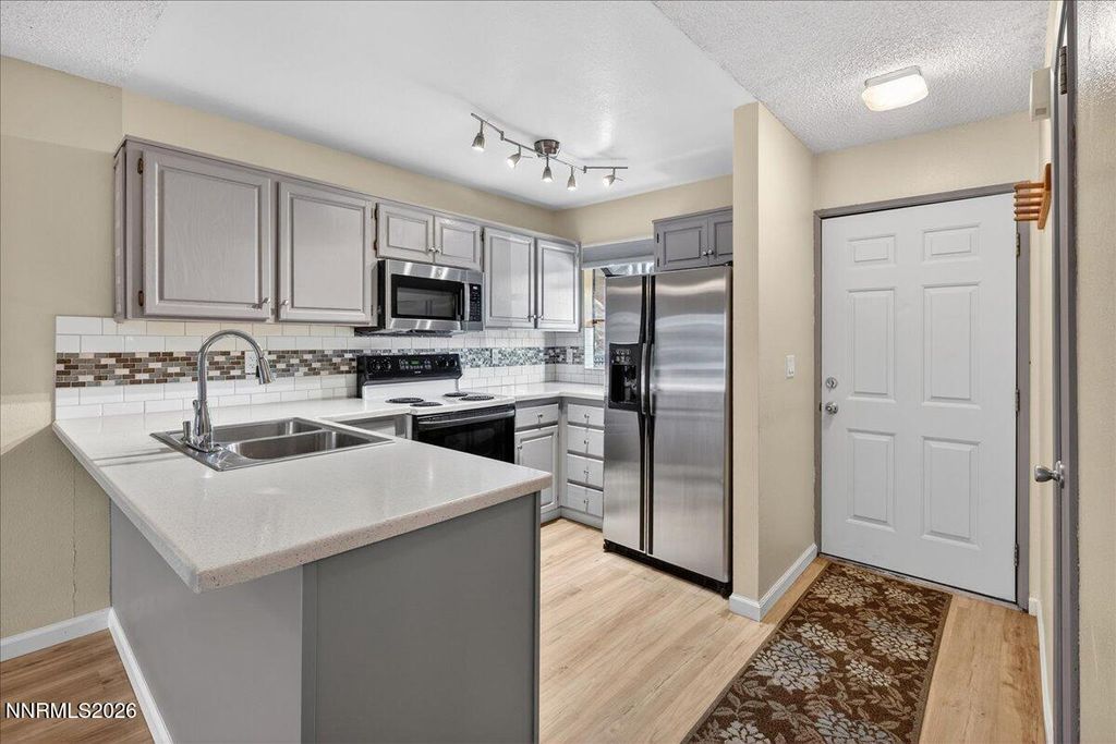 Photo of 2981 Tierra Verde E, Reno, NV 89512 (MLS # 260000849)