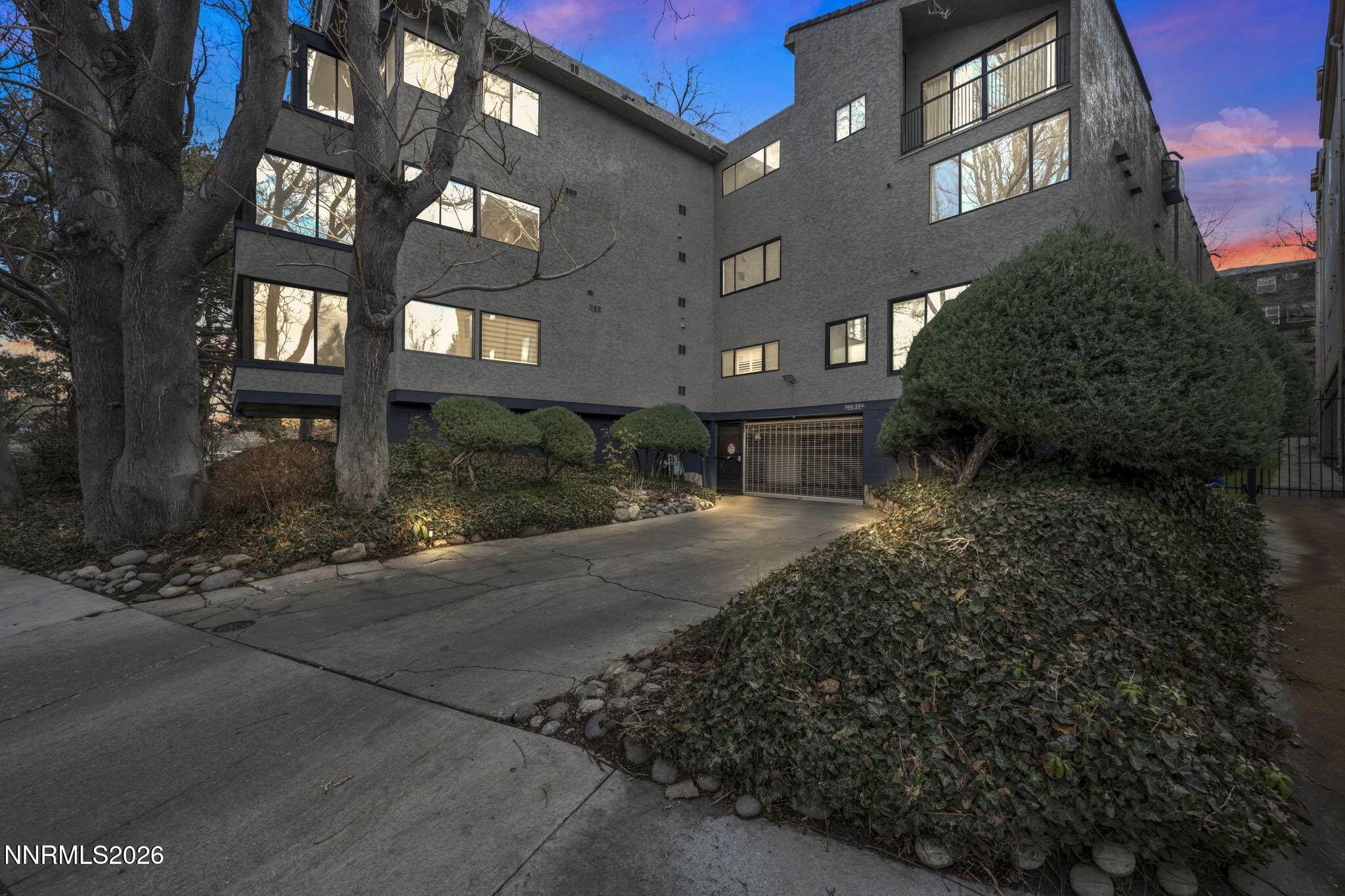 Front View w: Garage Dusk