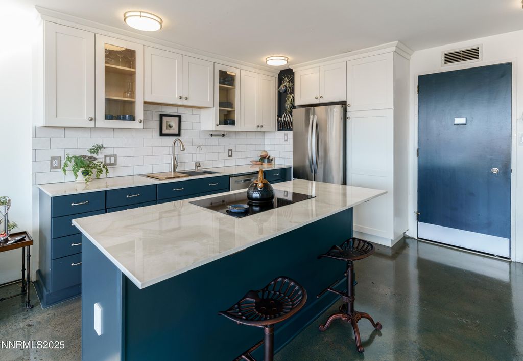 Photo of 100 N Arlington Avenue #7I, Reno, NV 89501 (MLS # 250058260)