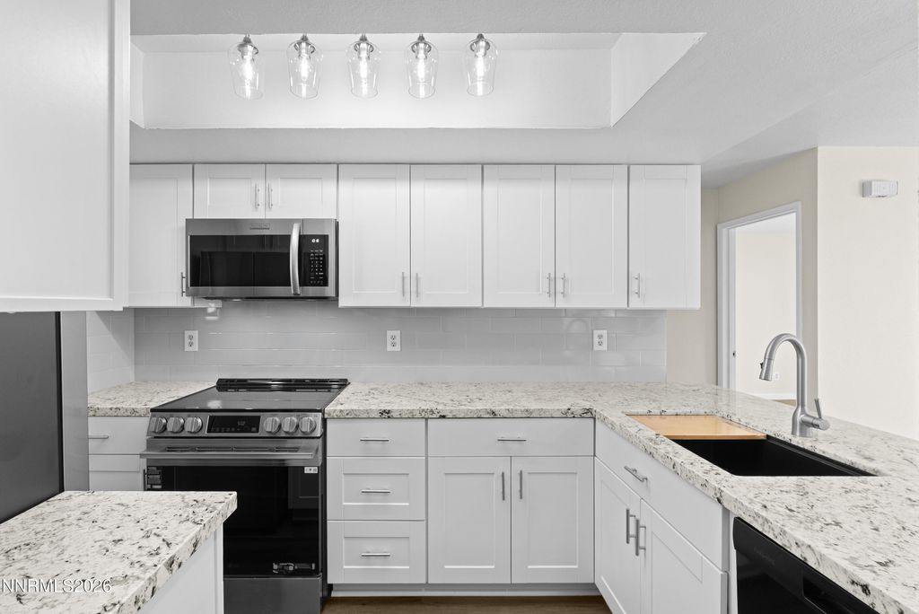 Photo of 8600 Dixon Lane, Reno, NV 89511 (MLS # 260000642)