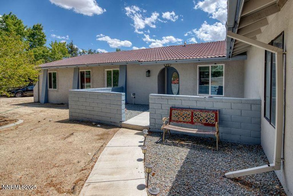Photo of 10150 Coyote Run Court, Reno, NV 89508 (MLS # 250054078)
