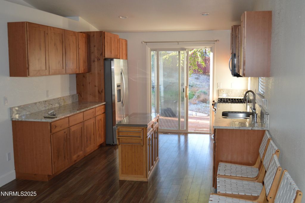Photo of 5688 Peach Court, Sun Valley, NV 89433 (MLS # 250056932)