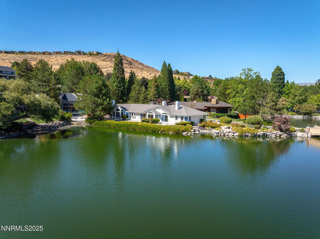 Photo of 2820 E Lake Ridge Shrs, Reno, NV 89519 (MLS # 250056950)