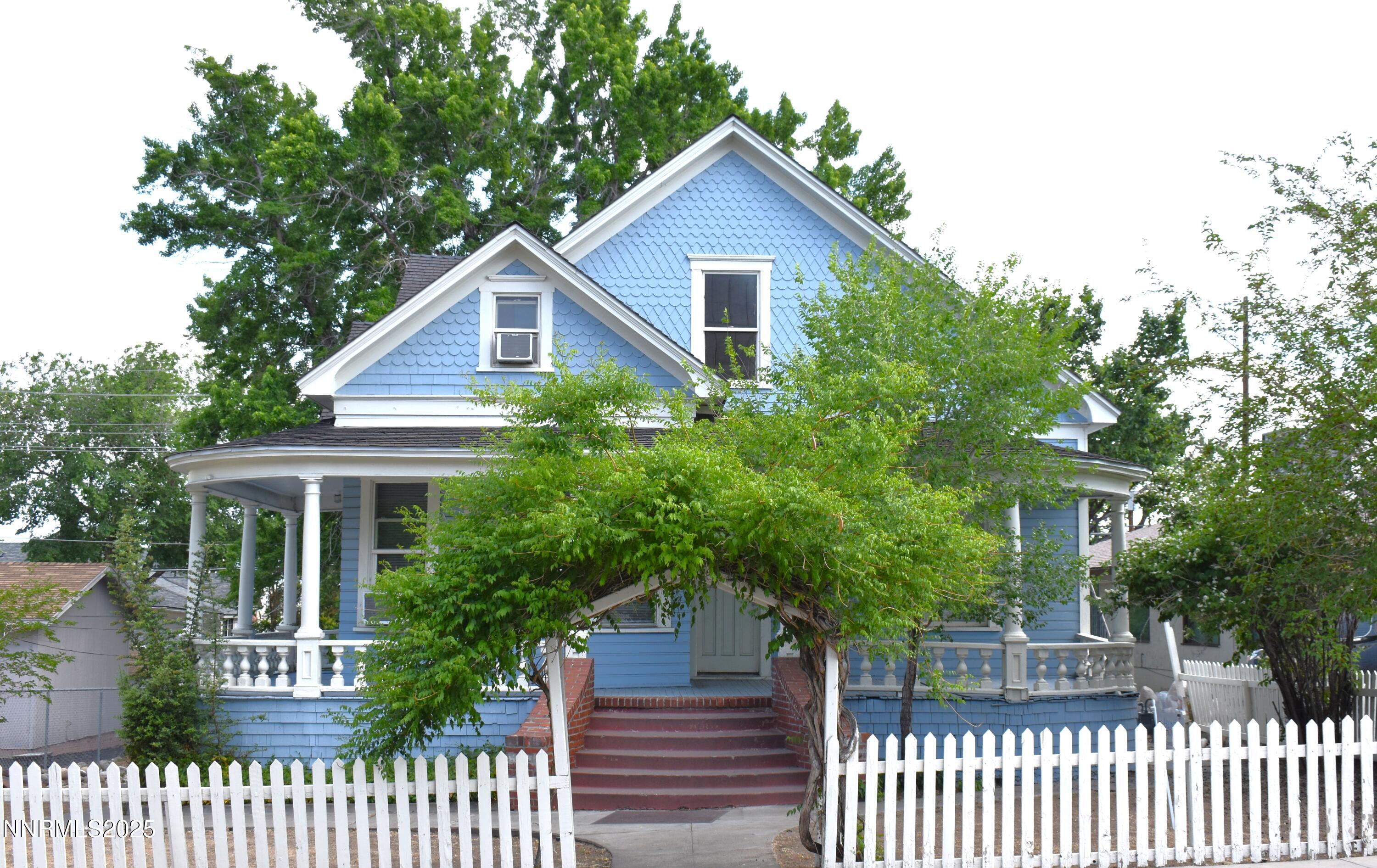 Exterior with green plant archway