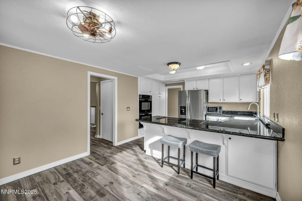 Photo of 4760 Warren Way, Reno, NV 89509 (MLS # 260003582)