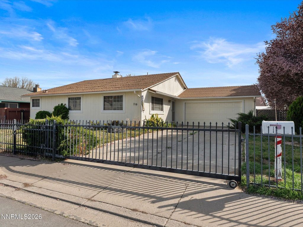 Photo of 719 Palmwood Drive, Sparks, NV 89434 (MLS # 260003448)