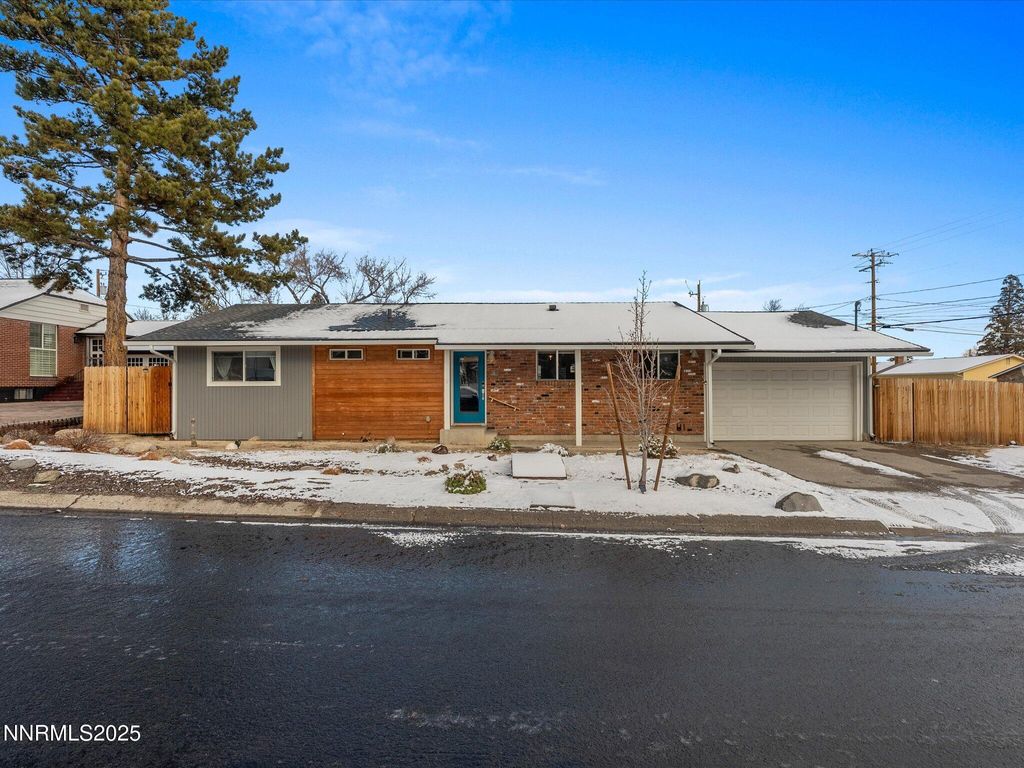 Photo of 301 Hillcrest Drive, Reno, NV 89509 (MLS # 260000305)