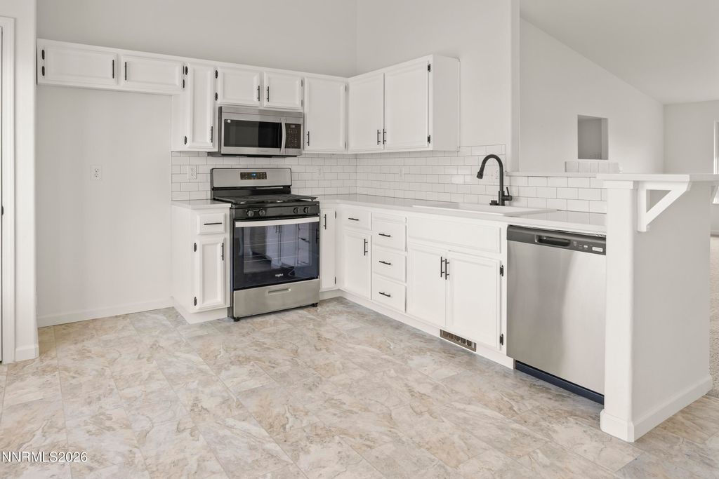 Photo of 911 Jessica Lane, Fernley, NV 89408 (MLS # 260000964)