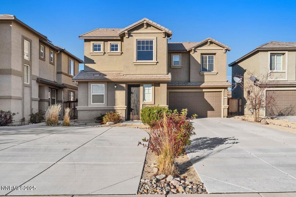 Photo of 6670 Russian Thistle Drive Dr, Sparks, NV 89436 (MLS # 250058687)