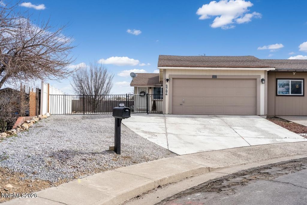Photo of 6764 Honeysuckle Court, Reno, NV 89506 (MLS # 260002640)