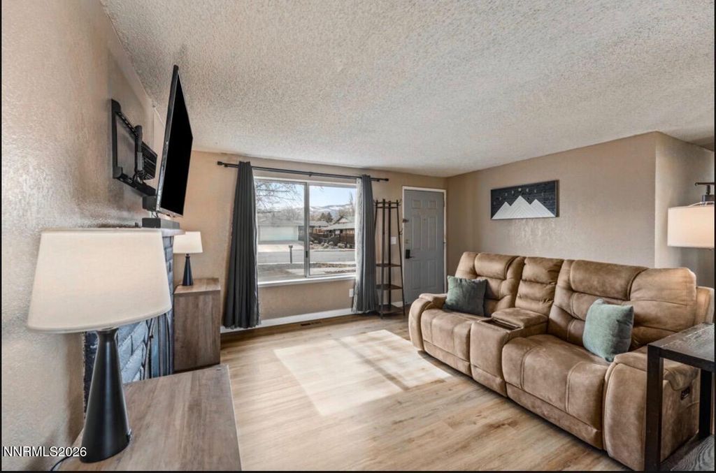 Photo of 10075 Hornblende Street, Reno, NV 89506 (MLS # 260001871)