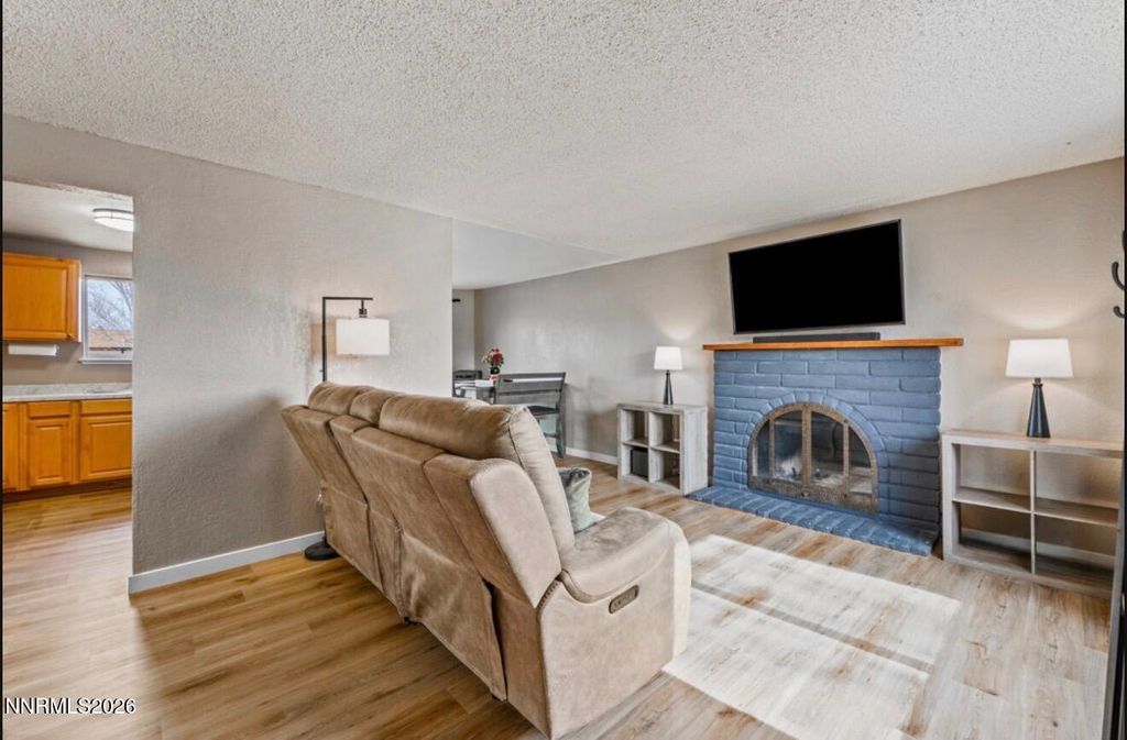 Photo of 10075 Hornblende Street, Reno, NV 89506 (MLS # 260001871)