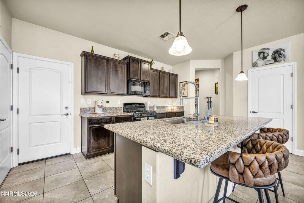 Photo of 7058 Cinder Village Drive, Sparks, NV 89436 (MLS # 260000719)