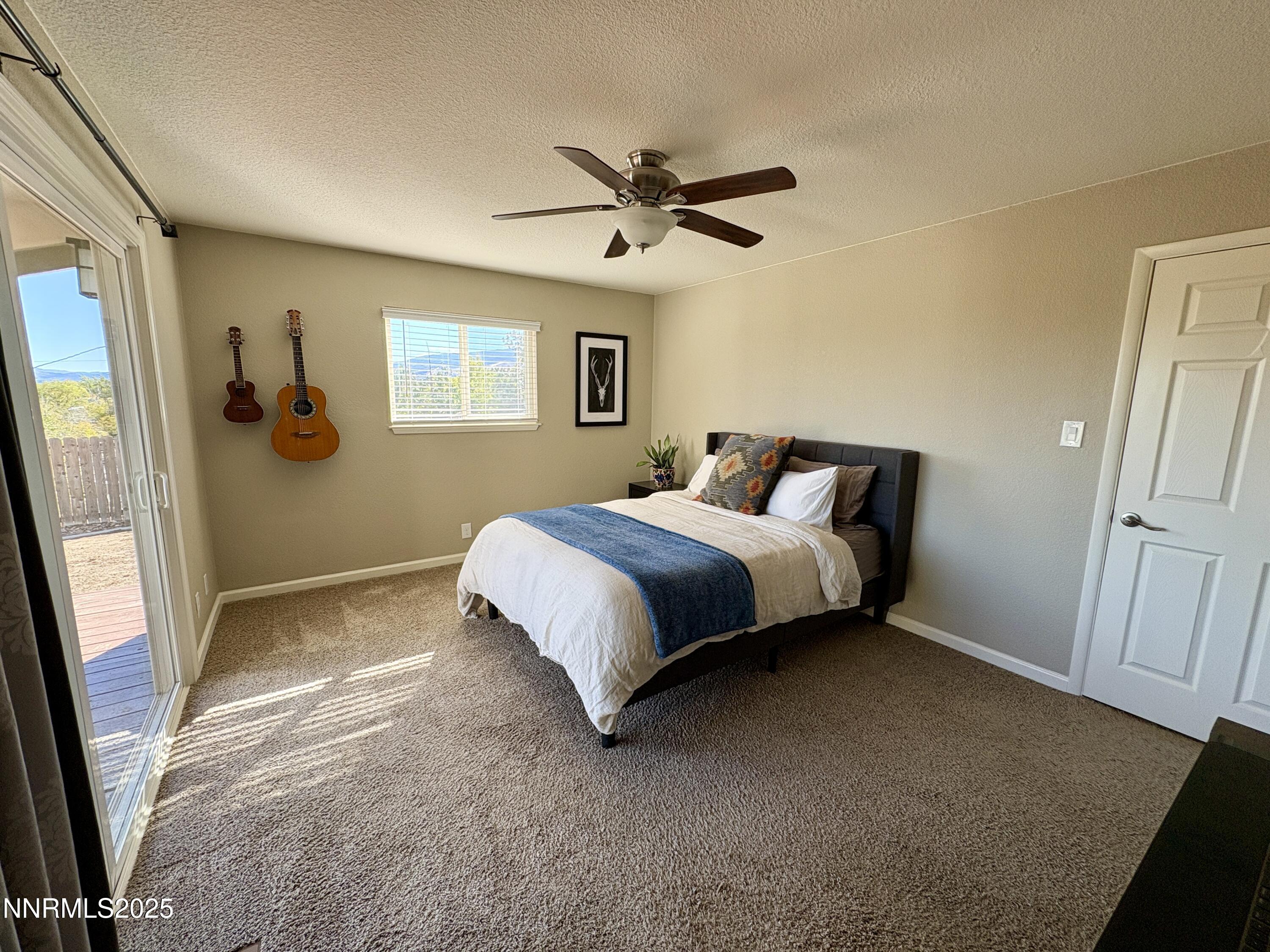 Bedroom 2 opens to deck