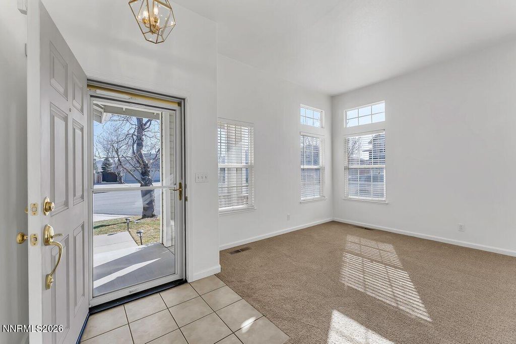 Photo of 9765 Rock River Drive, Reno, NV 89506 (MLS # 260001245)