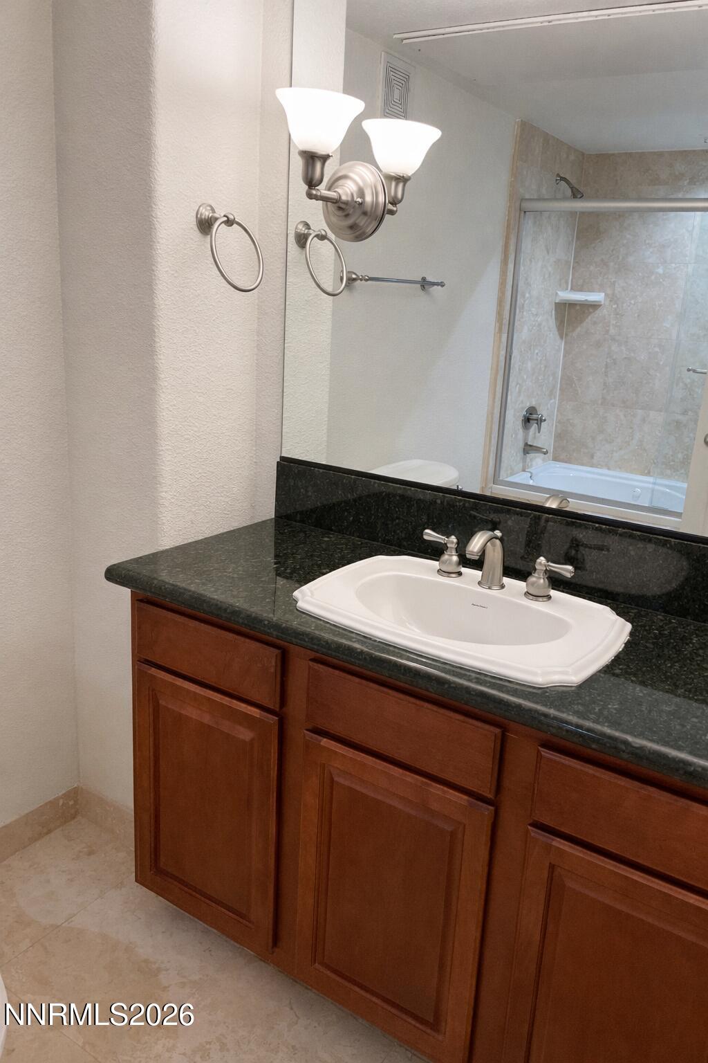 200 W 2nd st- bathroom sink bright