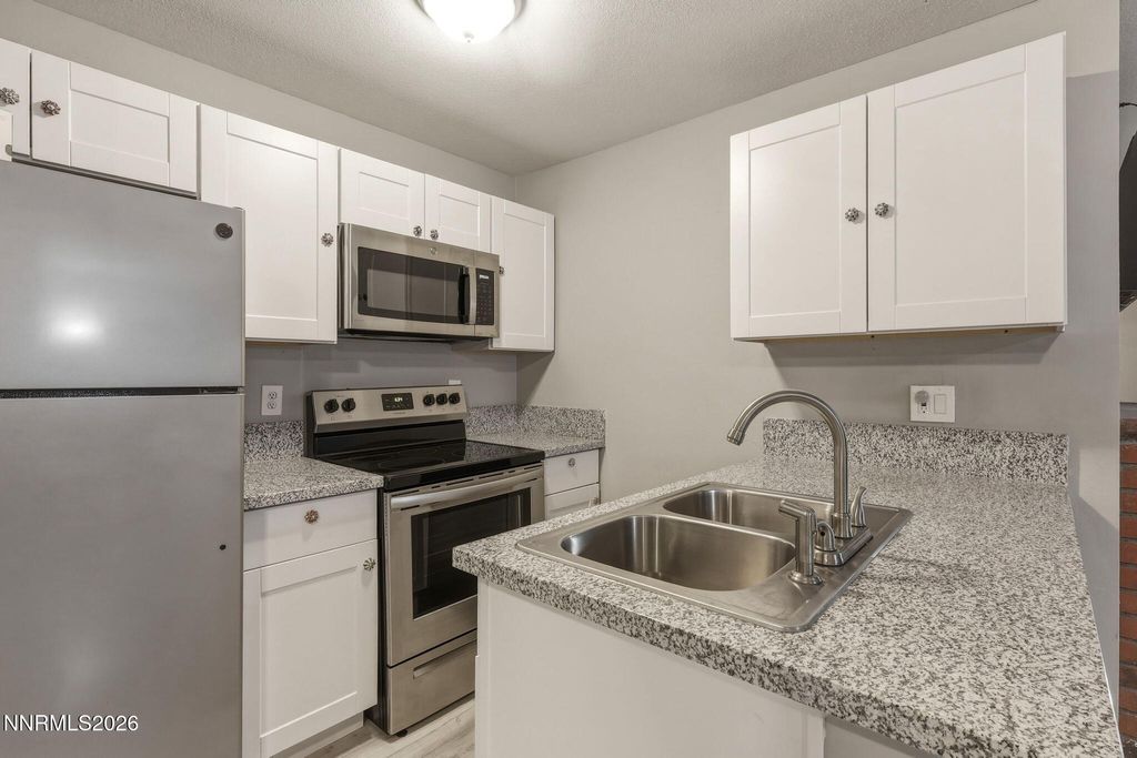 Photo of 4557 Reggie Road, Reno, NV 89502 (MLS # 260004880)