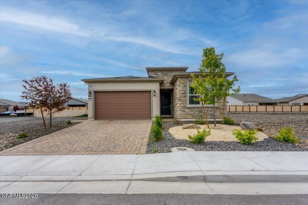 Photo of 7471 Rustic Towers Drive, Sparks, NV 89436 (MLS # 260005829)