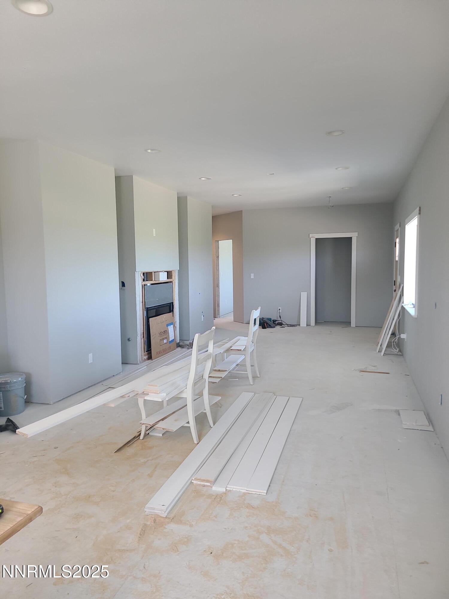 TOM INSIDE FRONT ROOM 25