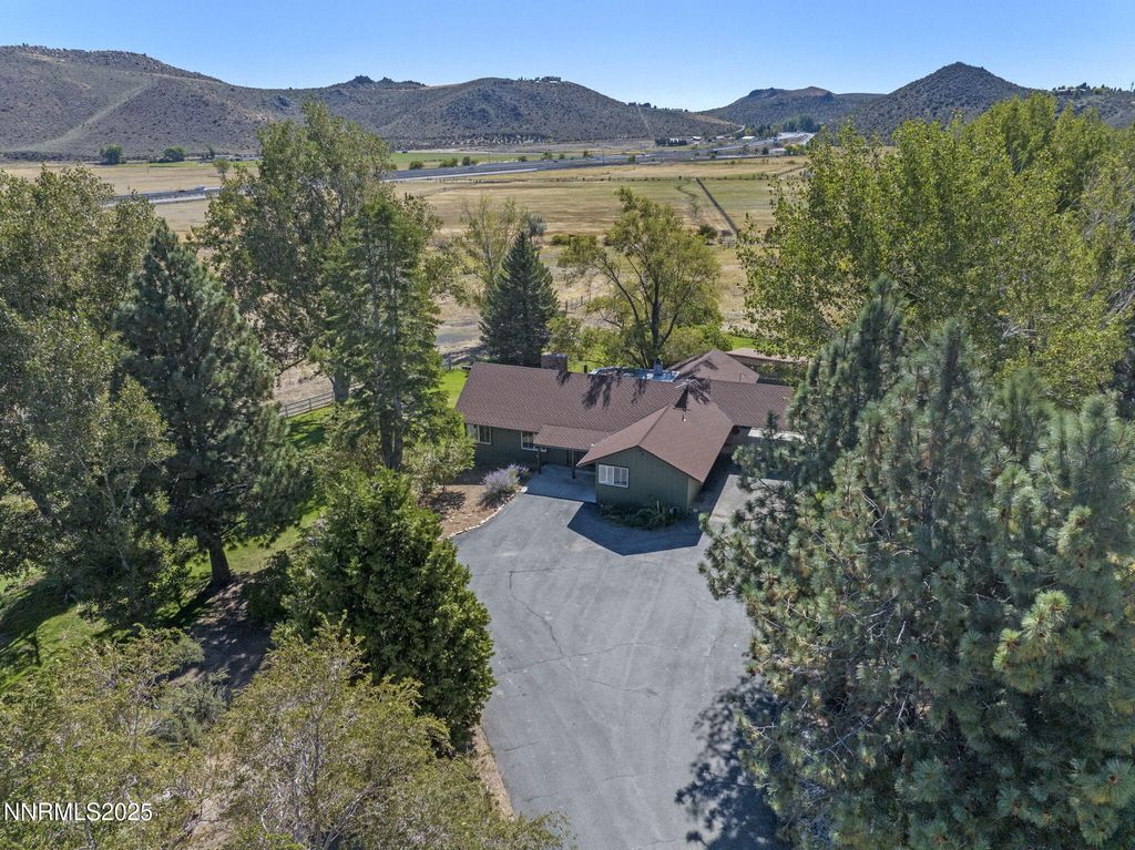 Photo of 50 Lonesome Polecat Lane, Washoe Valley, NV 89704 (MLS # 250058940)