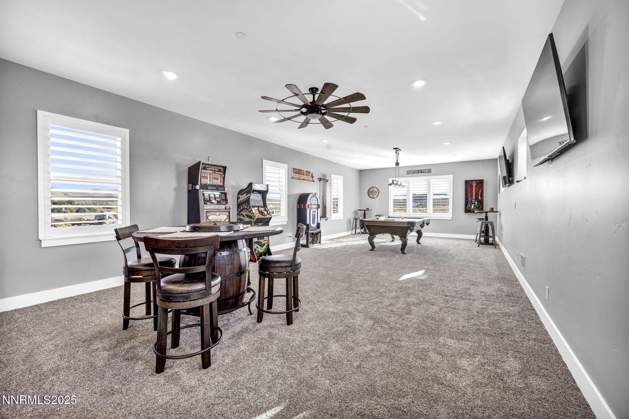 upstairs game room with 1/2 bath