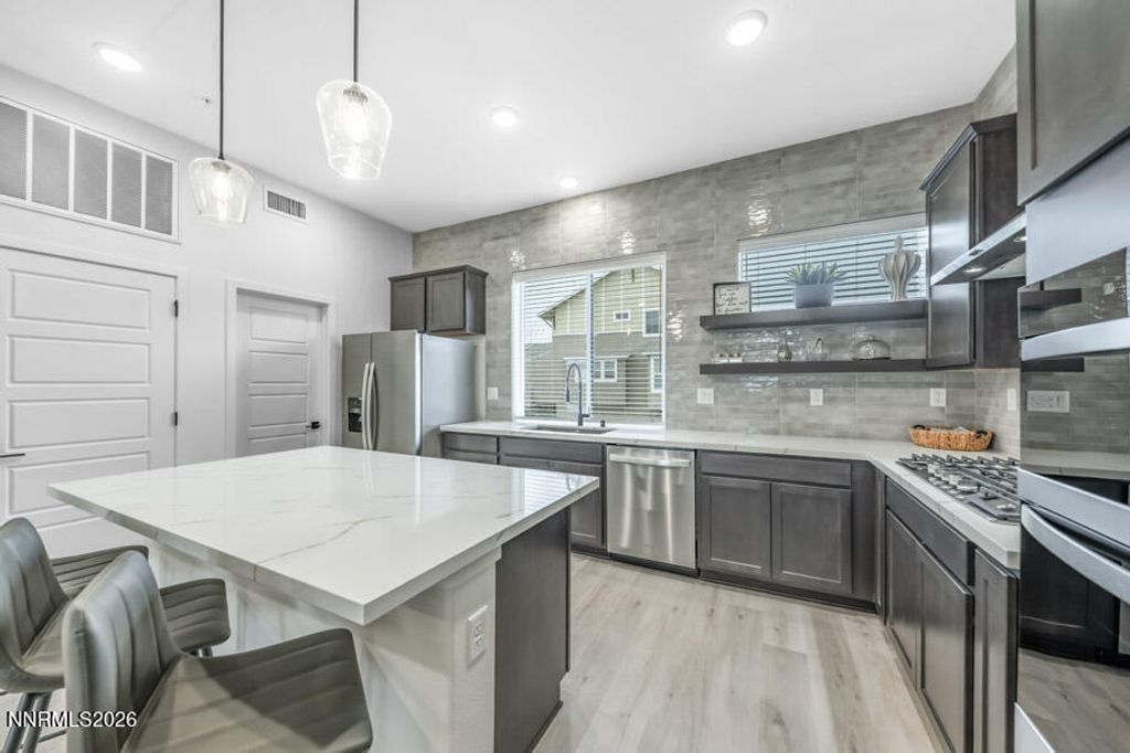 Photo of 166 Rissone Lane #LOT 31, Reno, NV 89503 (MLS # 260002250)