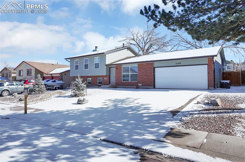 6569 E Gambol Quail Drive