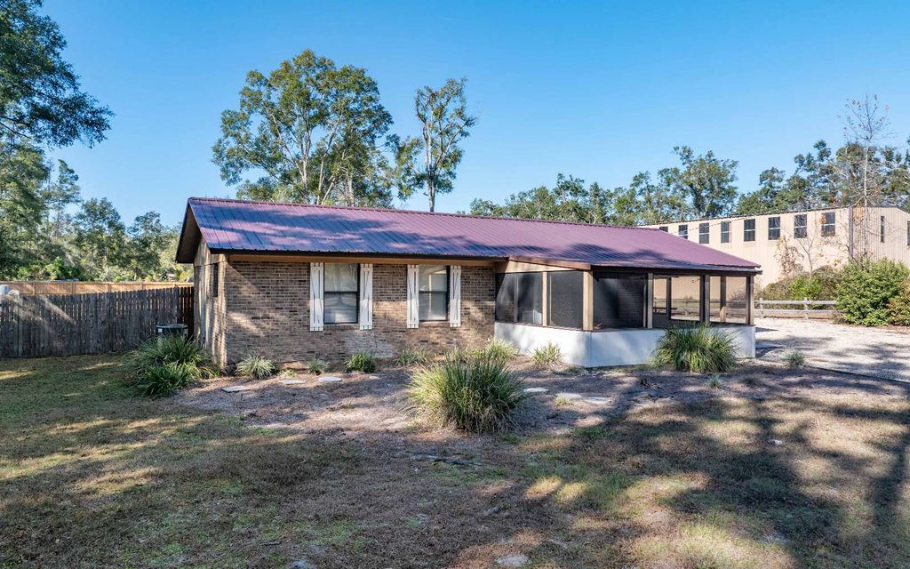 Photo of 9427 147th Rd, Live Oak, FL 32060 (MLS # 129646)