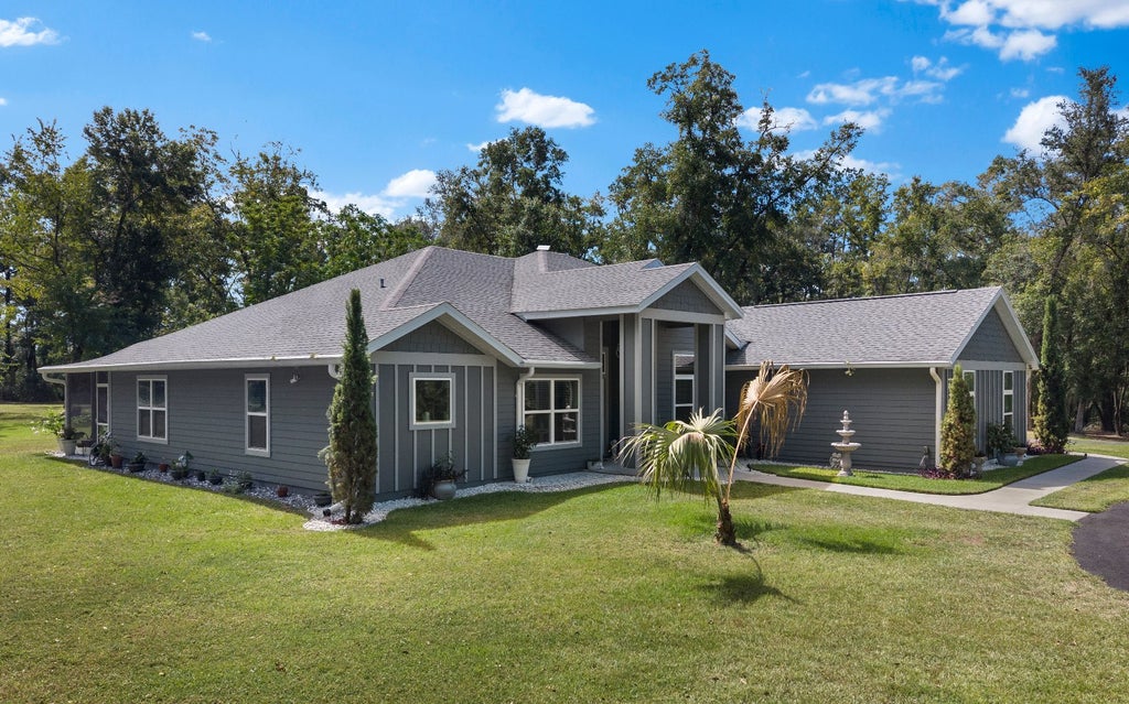 Photo of 336 SW Meadow Wood Glen, Lake City, FL 32024 (MLS # 133393)