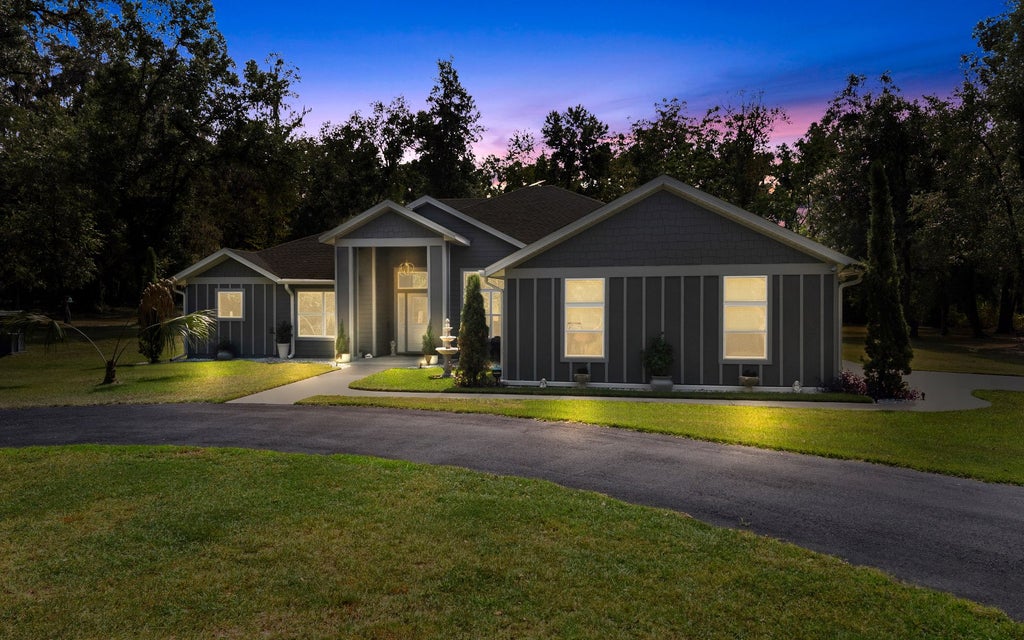 Photo of 336 SW Meadow Wood Glen, Lake City, FL 32024 (MLS # 133393)