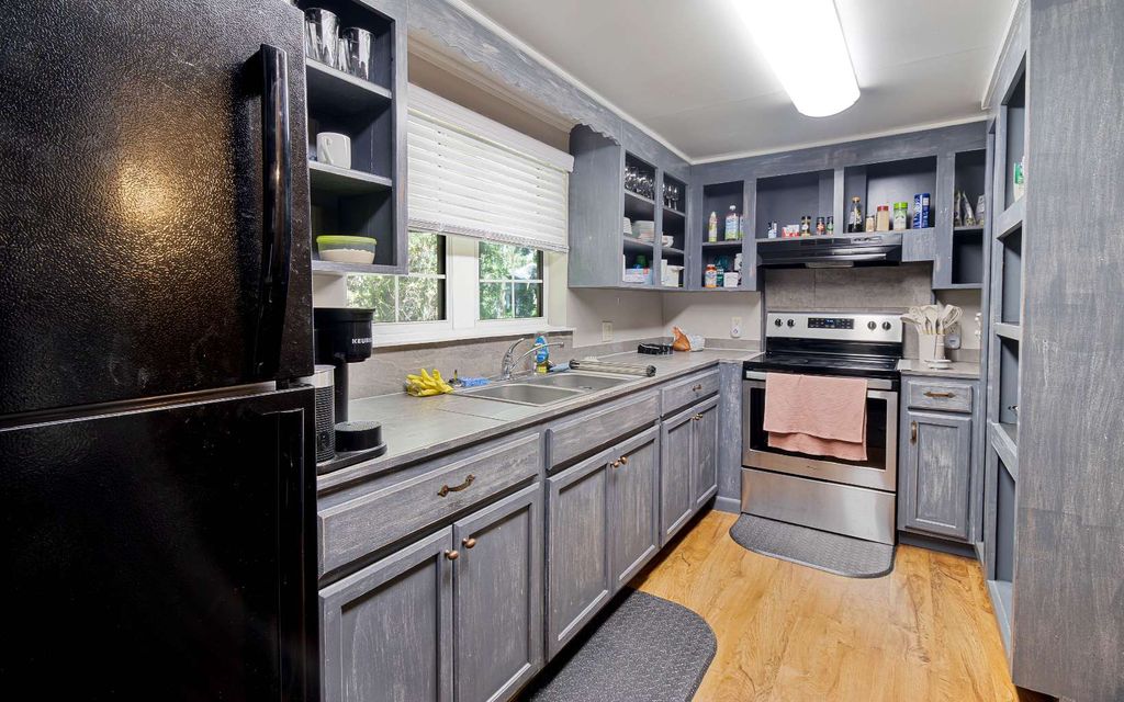 Photo of 313 NW Madison St, Lake City, FL 32055 (MLS # 130691)