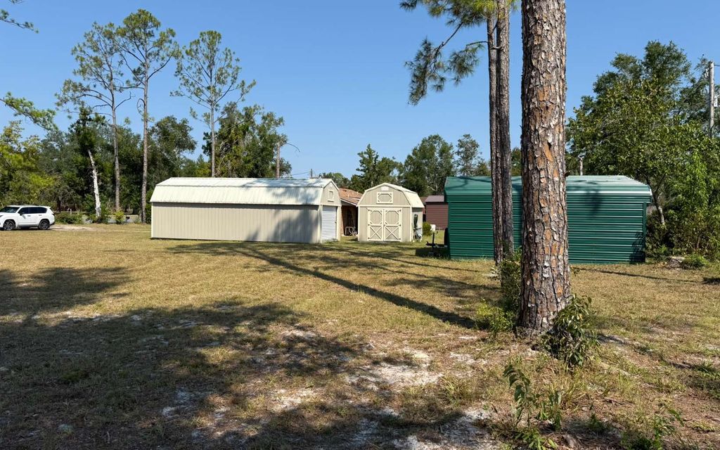 Photo of 10238 Cr 136, Live Oak, FL 32060 (MLS # 128693)