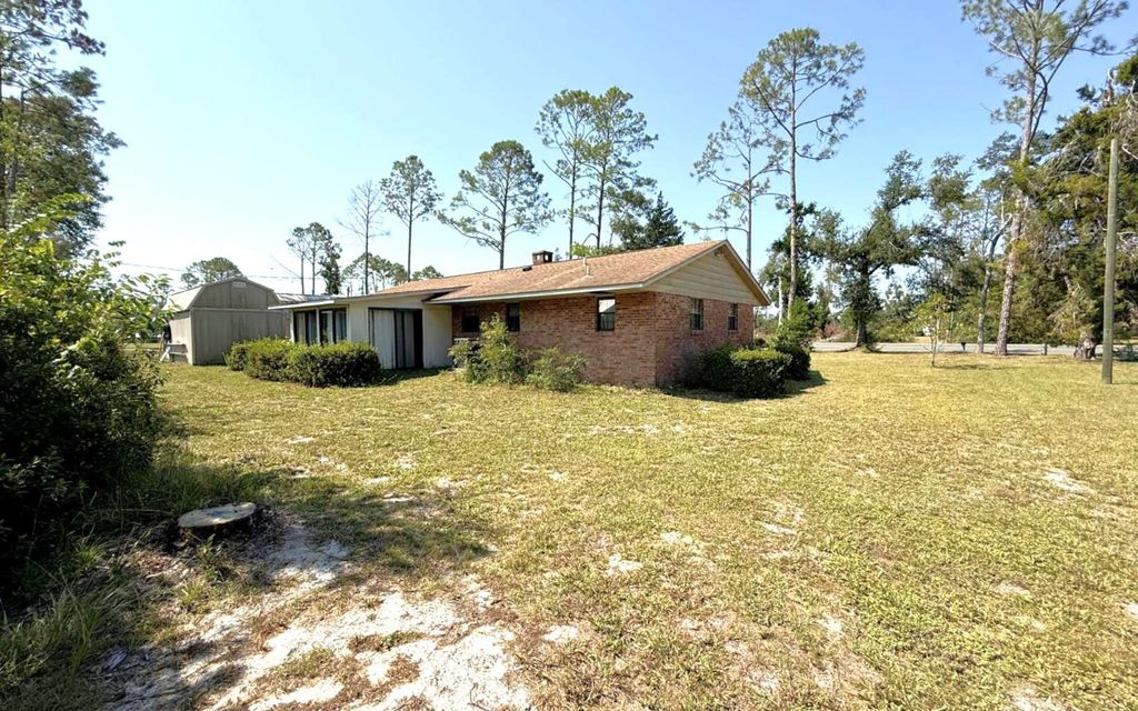 Photo of 10238 Cr 136, Live Oak, FL 32060 (MLS # 128693)